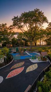 9201 Shore Road, Unit C209 Brooklyn, NY 11209 - Photo 21 of 23 a view of a yard with an outdoor space