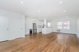 9201 Shore Road, Unit C209 Brooklyn, NY 11209 - Photo 4 of 23 a view of empty room with wooden floor