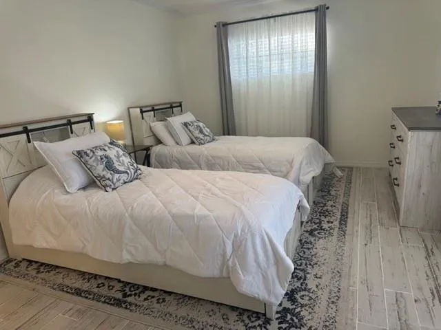 a view of livingroom with furniture and wooden floor