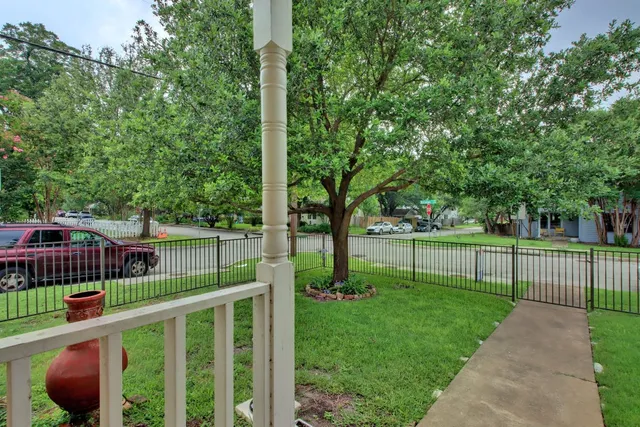 a view of a deck with a fence