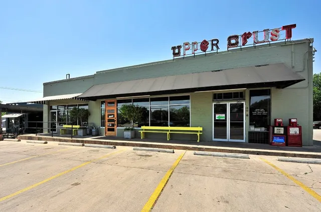 a view of a building with the street
