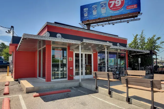 a view of a building with sitting area