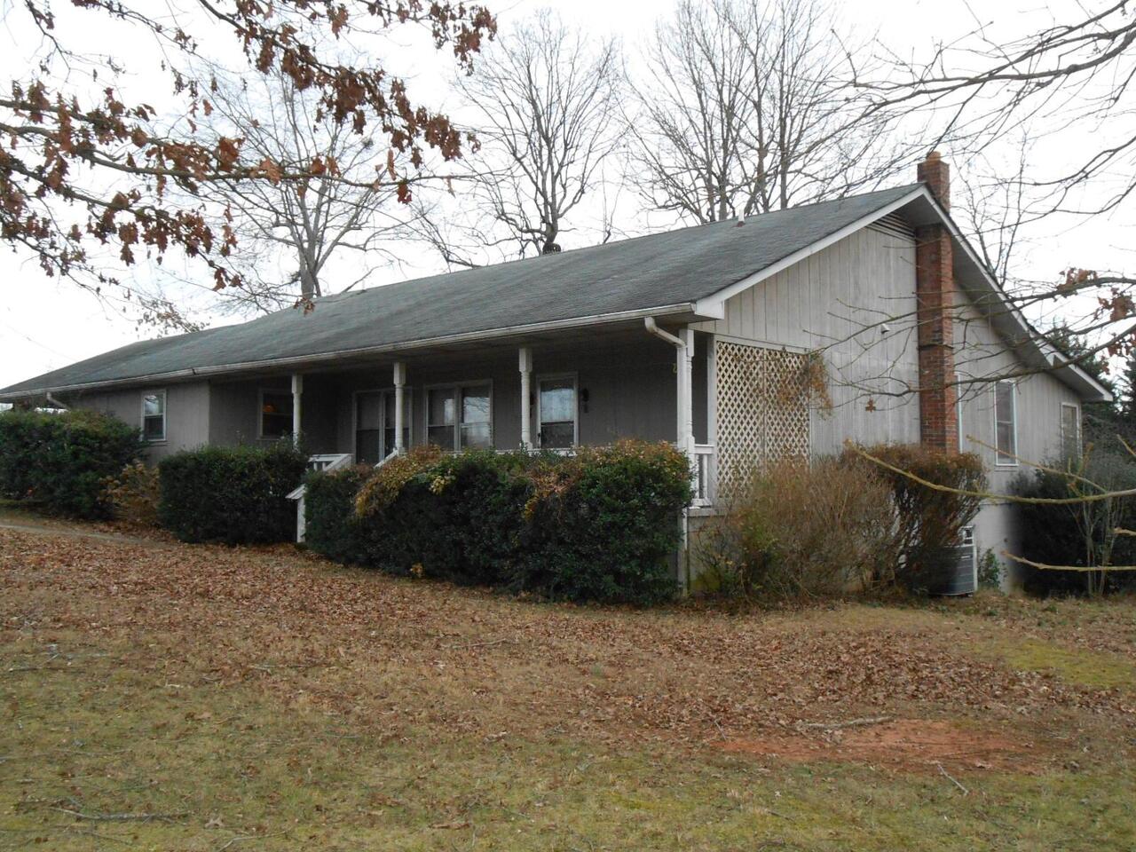 1979 Westmoreland Road Cleveland, GA 30528 - Photo 1 of 1 a view of a yard with a house