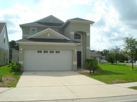 4128 Day Bridge Place Ellenton, FL 34222 - Photo 1 of 1 a front view of a house with a yard