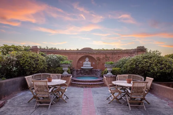 a view of a terrace with a garden