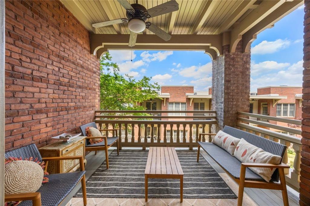 266 11th Street Northeast, Unit 203 Atlanta, GA 30309 - Photo 23 of 50 a view of a two chairs in the balcony