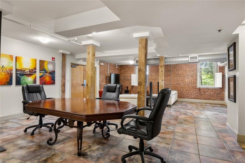 266 11th Street Northeast, Unit 203 Atlanta, GA 30309 - Photo 32 of 50 a view of a dining room with furniture