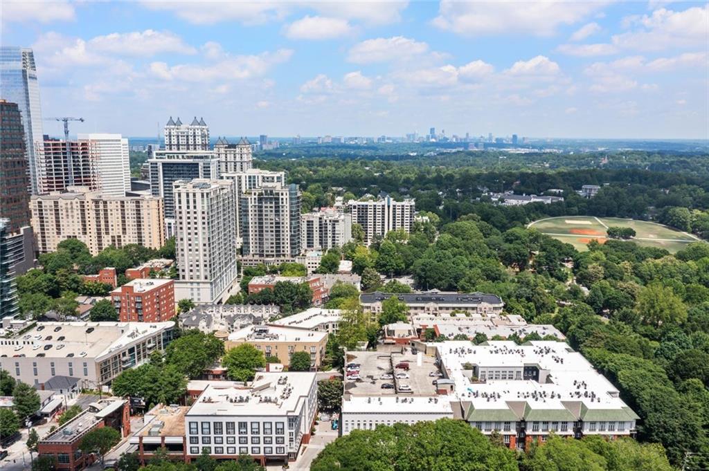 266 11th Street Northeast, Unit 203 Atlanta, GA 30309 - Photo 45 of 50 a view of a city that has tall buildings