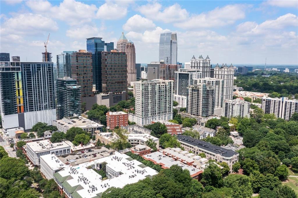 266 11th Street Northeast, Unit 203 Atlanta, GA 30309 - Photo 49 of 50 a view of a city with tall buildings