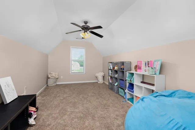 a workspace with furniture and a window