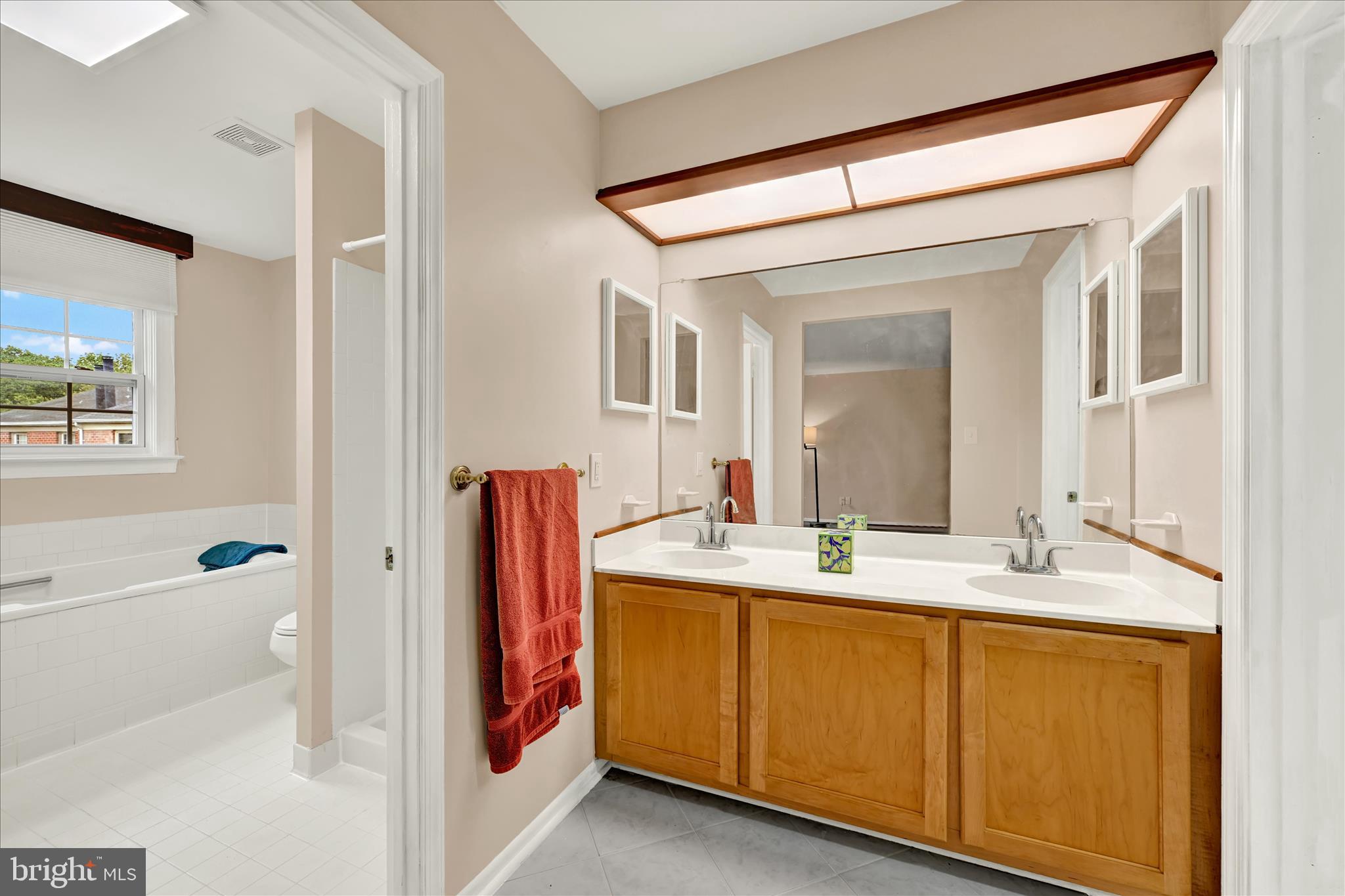 2317 Wonderview Road Lutherville-Timonium, MD 21093 - Photo 16 of 27 a bathroom with a sink and a mirror