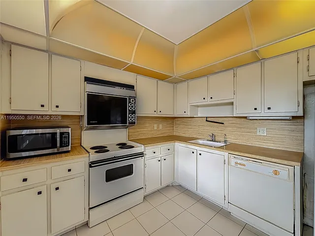 a bedroom with a bed and a shower