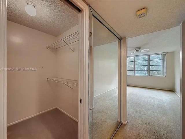 a view of a room with racks on the wall