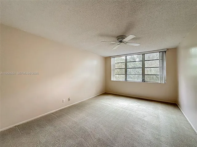 a bathroom with a glass door shower