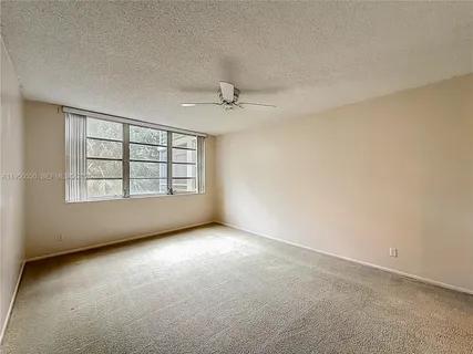 a bathroom with a double vanity sink and mirror