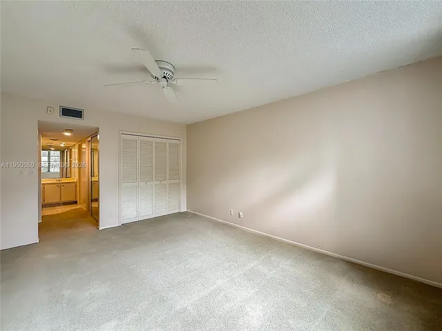 a bathroom with a sink and a large mirror