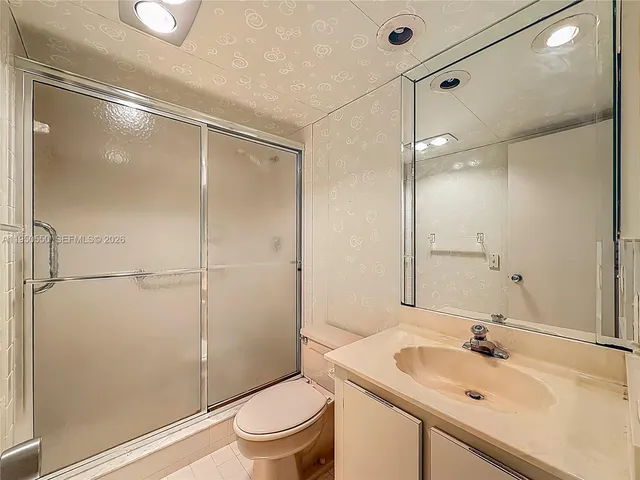 a view of a city with tall buildings