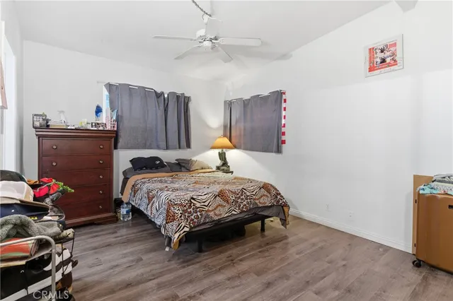 a bedroom with a bed and a closet