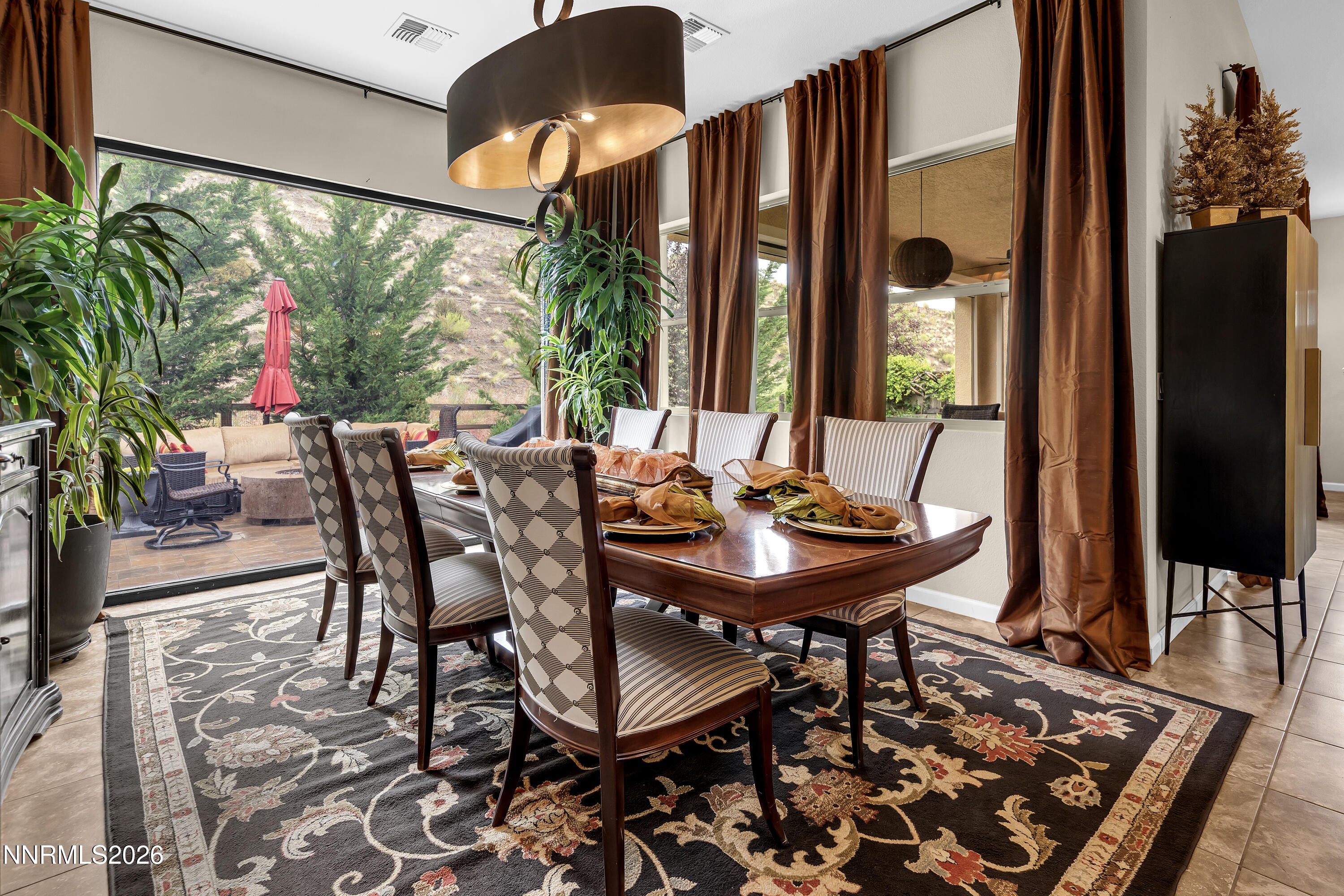 9021 Iron Sky Court Reno, NV 89523 - Photo 12 of 39 a view of a tables and chairs in patio