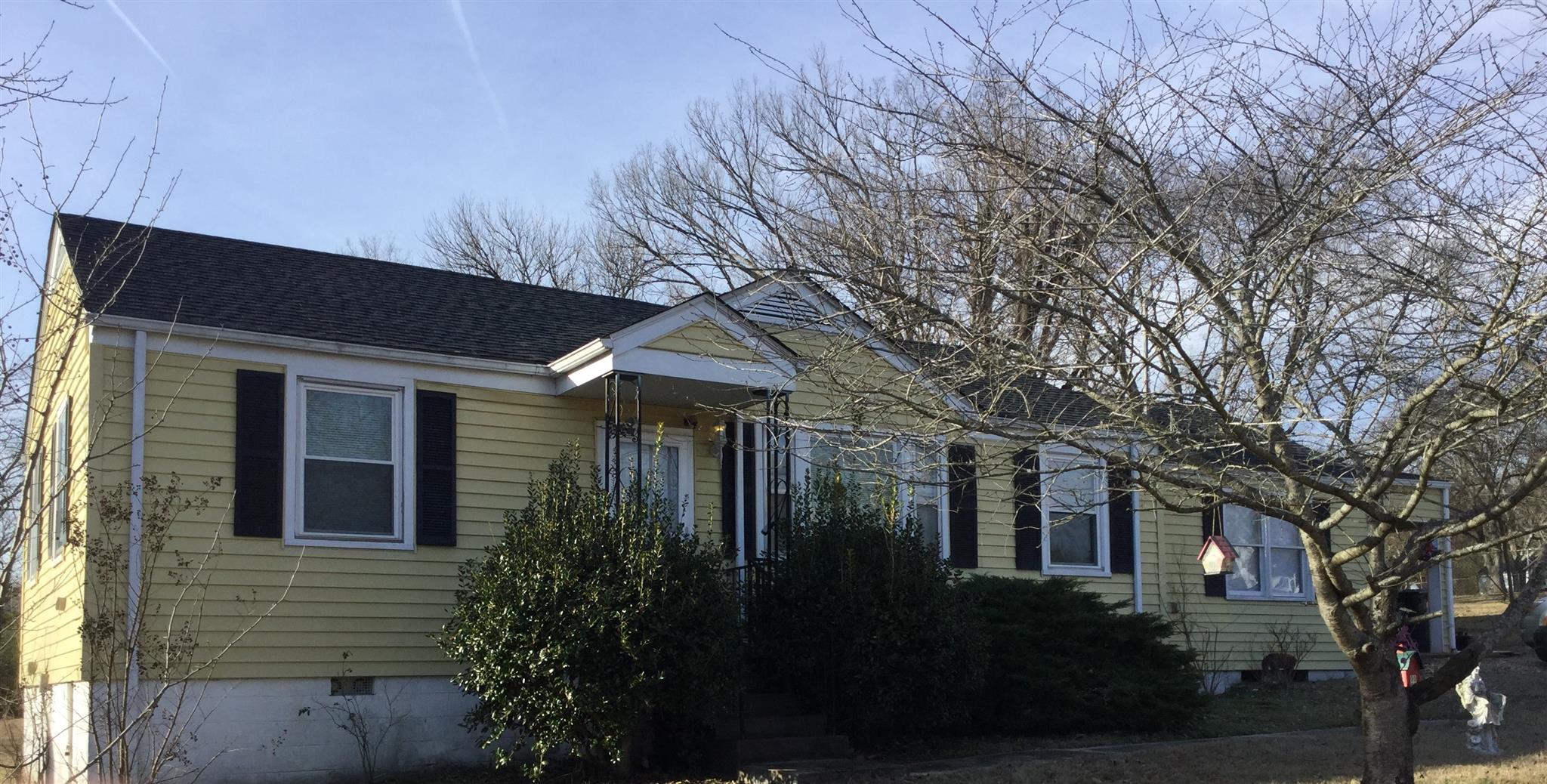 220 Randy Road Madison, TN 37115 - Photo 1 of 2 a front view of a house with a garden