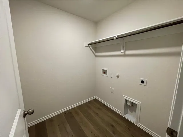 a view of room with hardwood floor