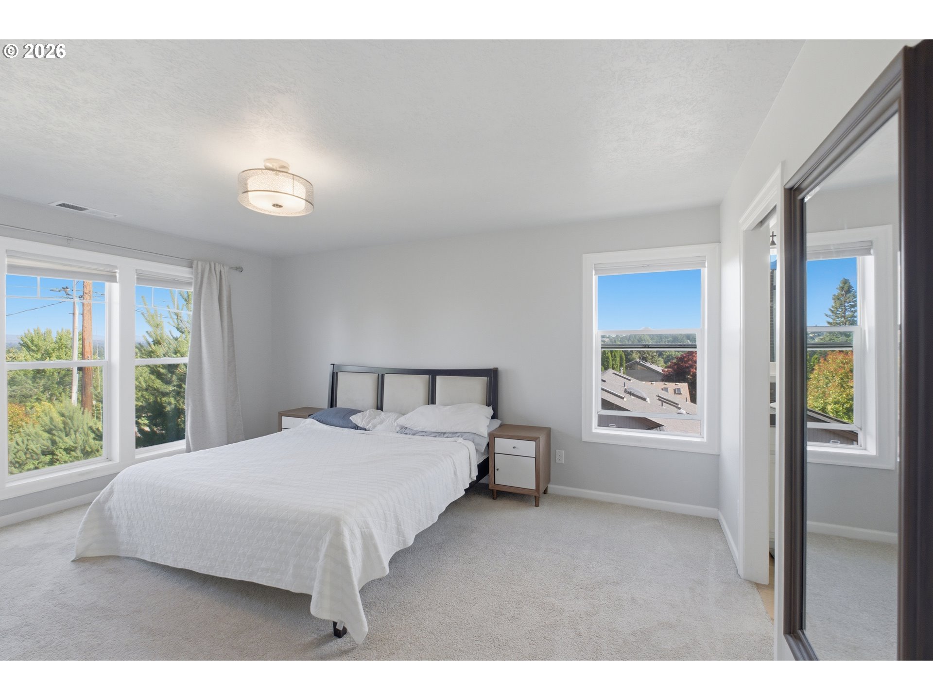 2925 Doaks Ferry Road Northwest Salem, OR 97304 - Photo 28 of 47 a bedroom with a large bed and a window