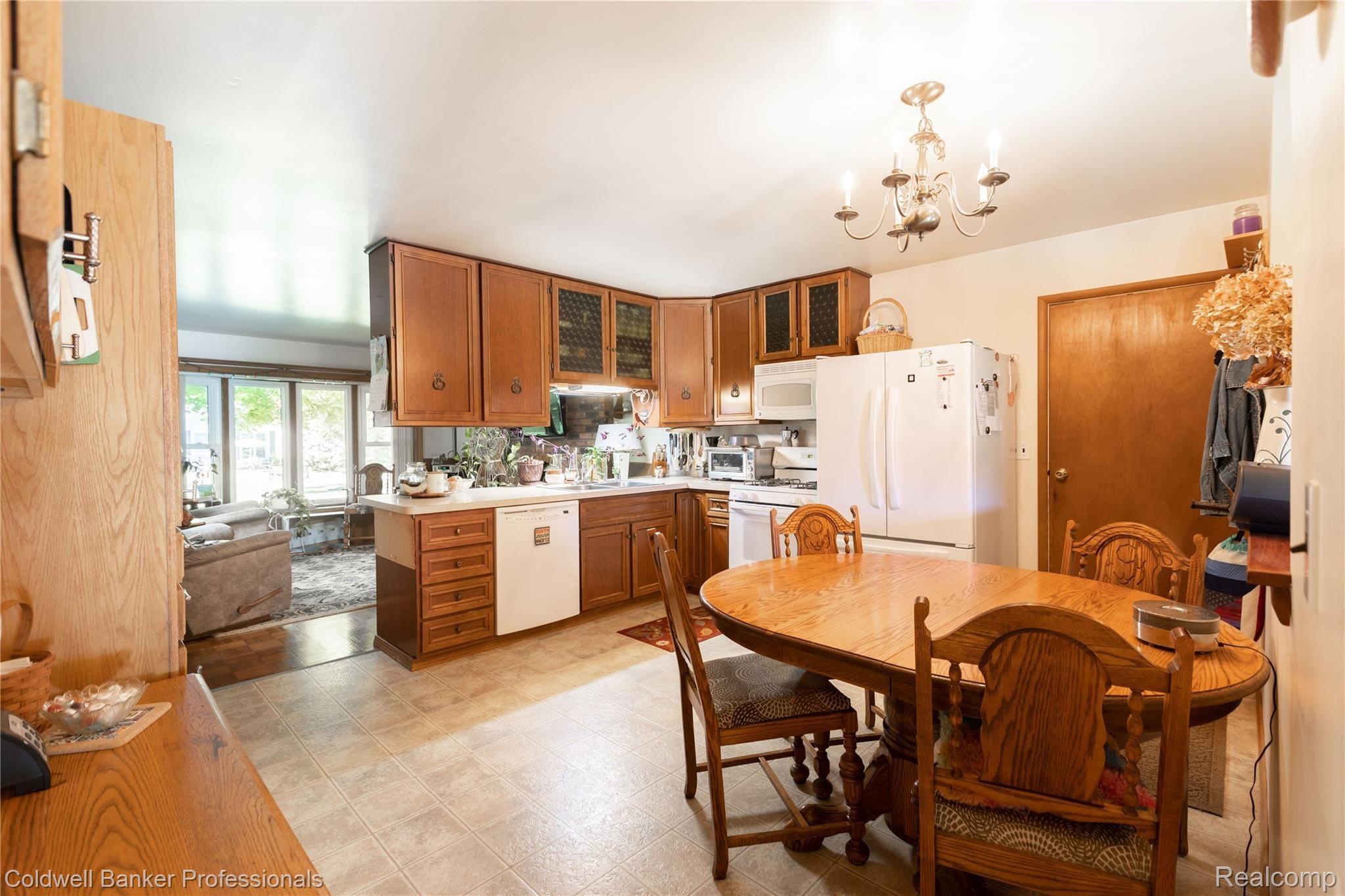 1969 Roxbury Run Wixom, MI 48393 - Photo 13 of 29 Centrally located Kitchen
