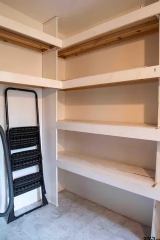 a view of storage and utility room