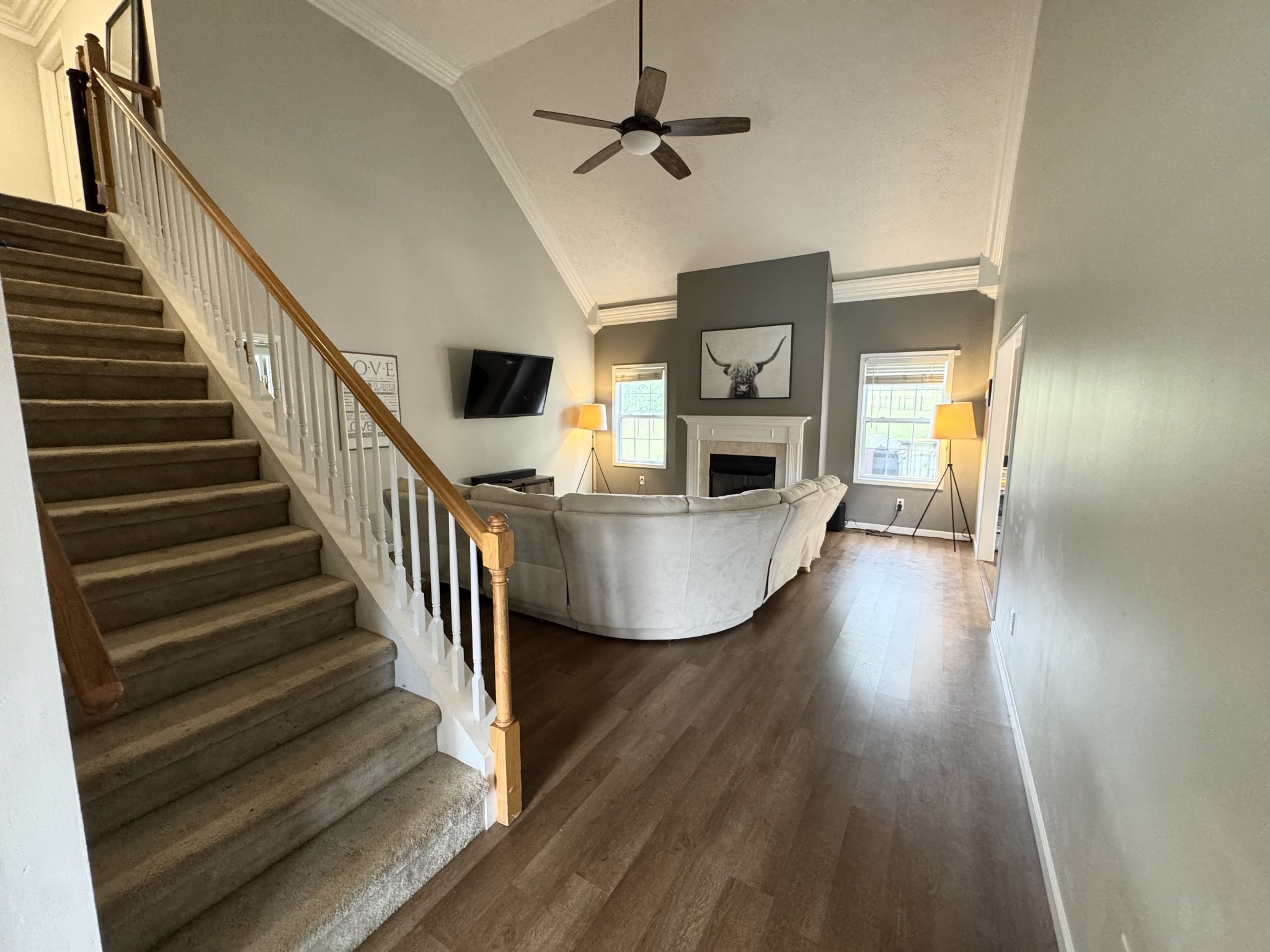 520 Briarhill Road Lebanon, TN 37087 - Photo 15 of 37 a view of a hallway with wooden floor fireplace and a window