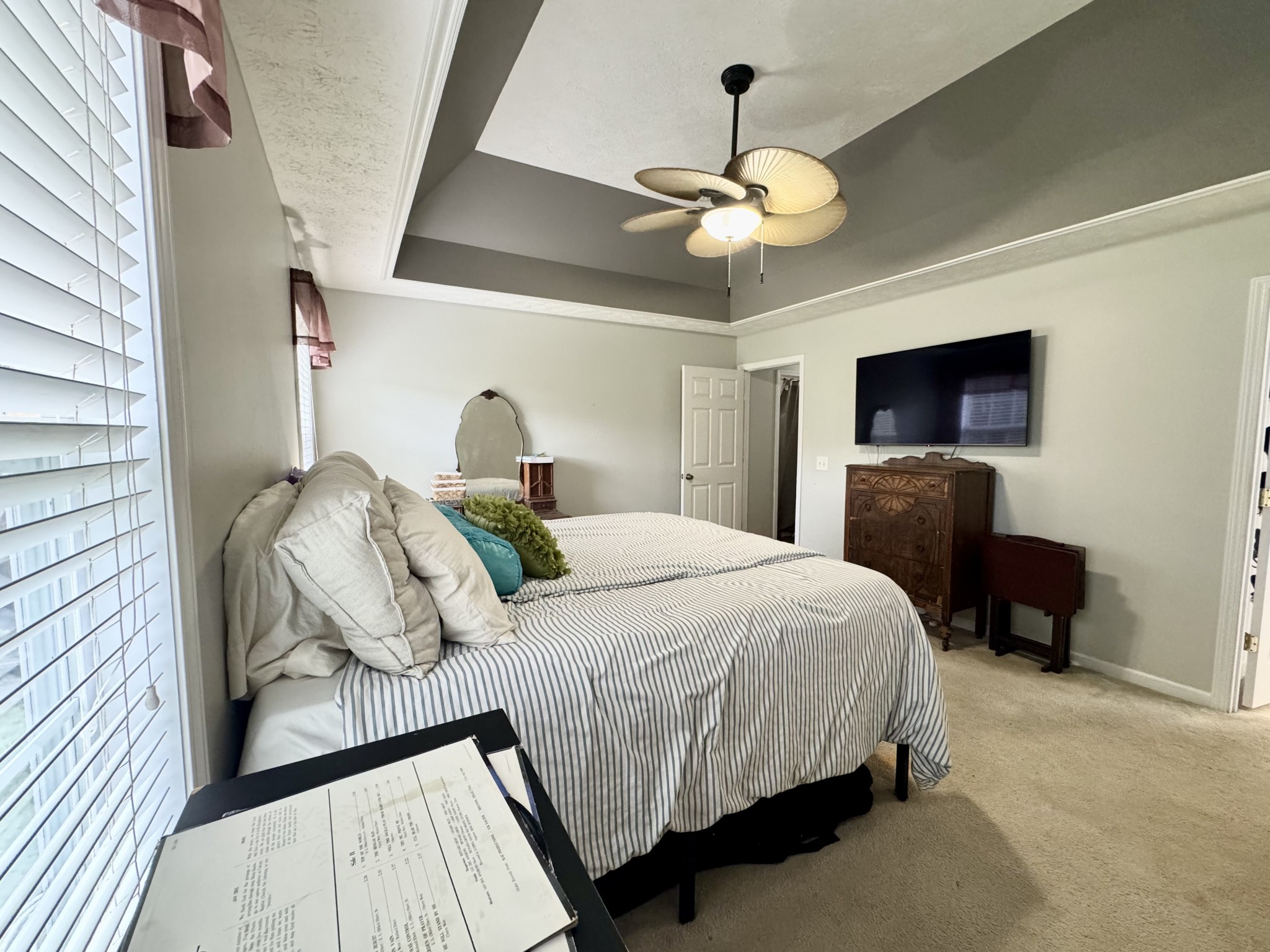 520 Briarhill Road Lebanon, TN 37087 - Photo 21 of 37 a bedroom with a bed and a chandelier