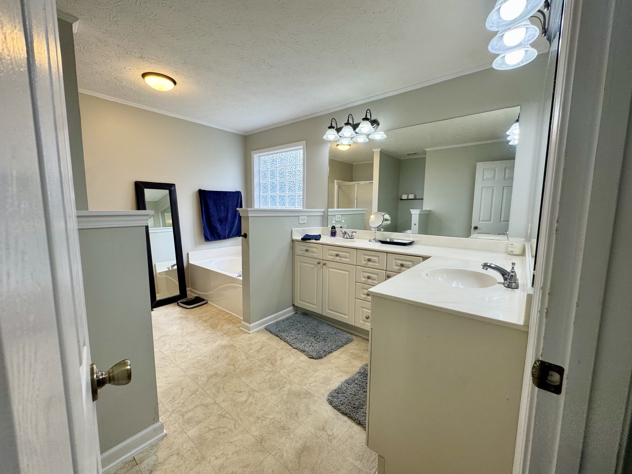 520 Briarhill Road Lebanon, TN 37087 - Photo 22 of 37 a bathroom with a sink double vanity and a mirror