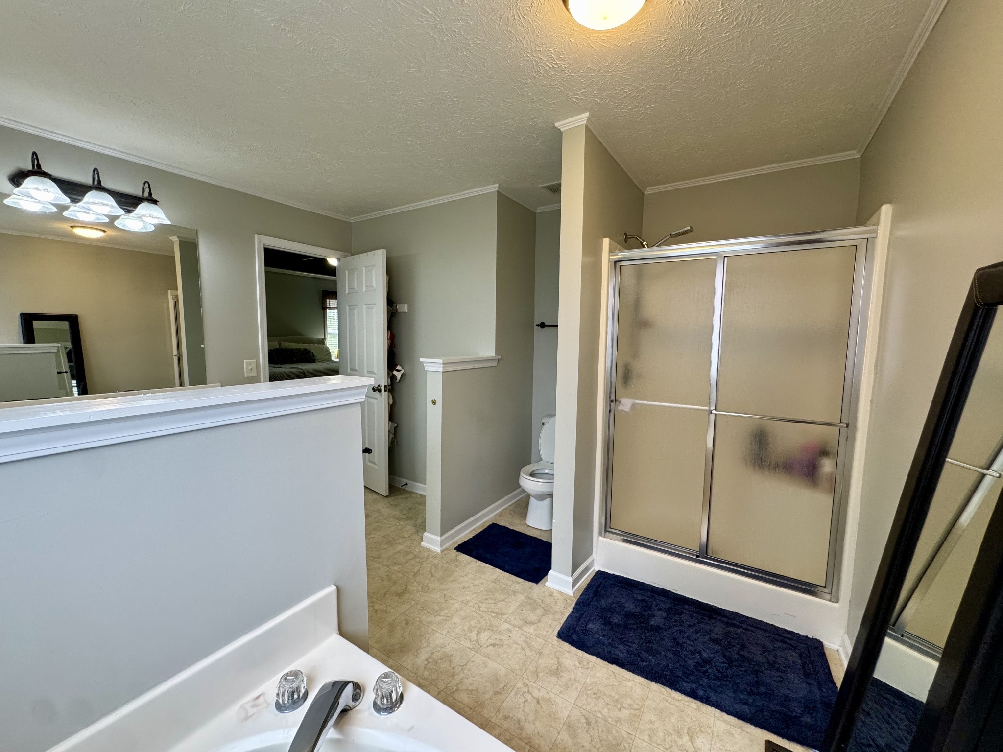 520 Briarhill Road Lebanon, TN 37087 - Photo 24 of 37 a view of a hallway with wooden floor and a living room