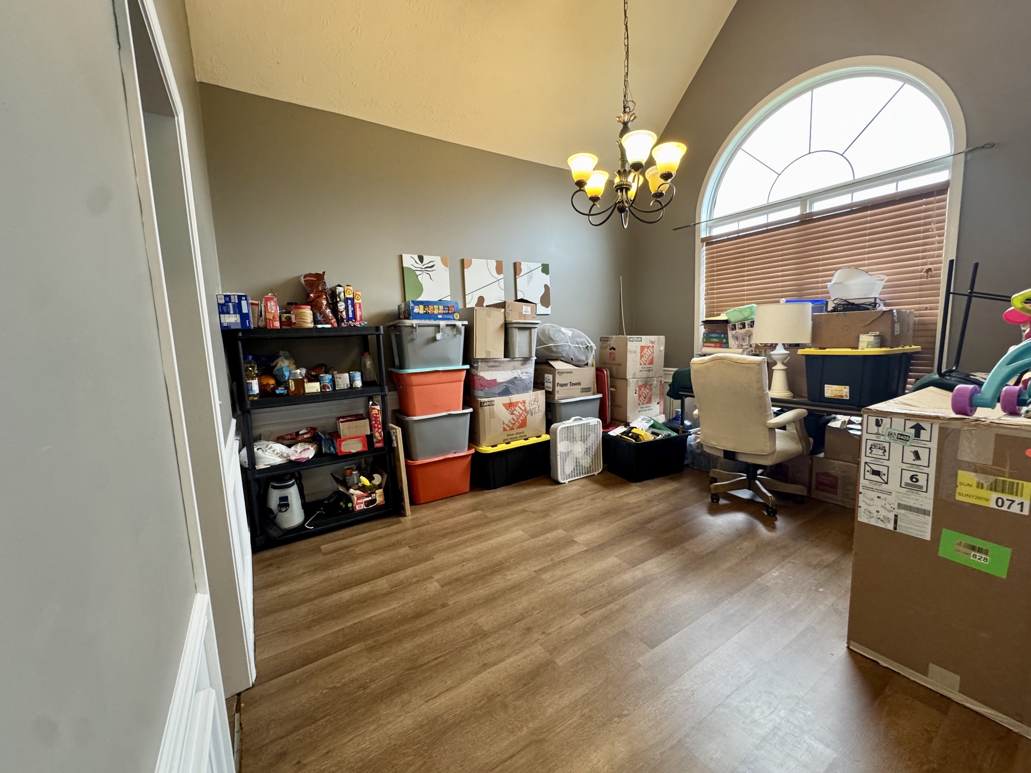 520 Briarhill Road Lebanon, TN 37087 - Photo 5 of 37 a living room with lots of furniture and a chandelier