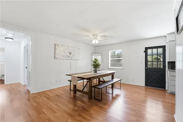 a workspace with furniture and wooden floor
