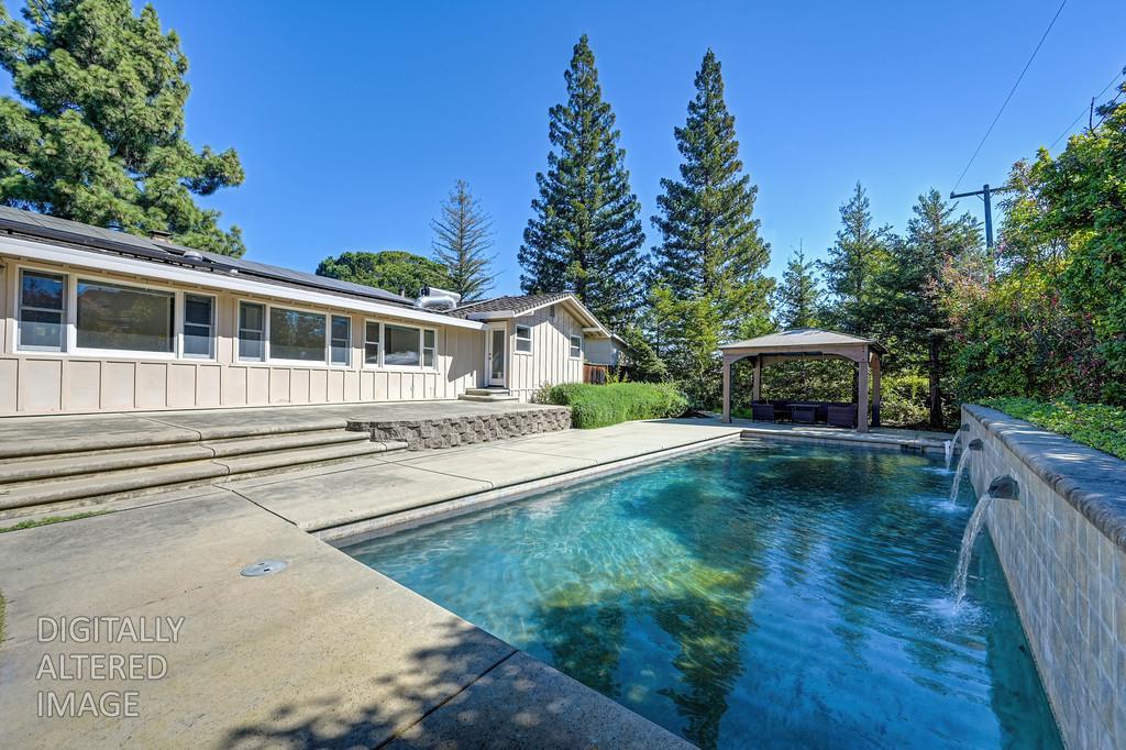 6730 Lakeview Drive Carmichael, CA 95608 - Photo 1 of 1 a front view of a house with garden