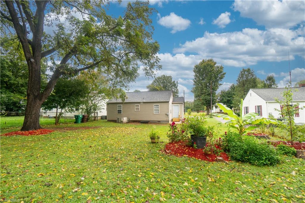 1500 Valley Ridge Drive High Point, NC 27260 - Photo 7 of 27 Mature trees and lush garden beds await you!