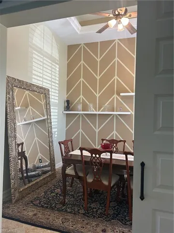 a view of a workspace with furniture