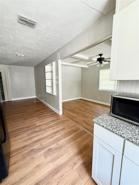 908 Sycamore Athens, TX 75751 - Photo 14 of 28 a view of kitchen and utility room