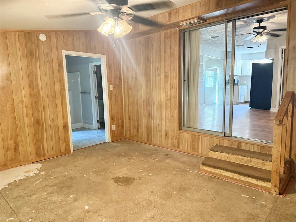 908 Sycamore Athens, TX 75751 - Photo 15 of 28 a view of a bathroom with a tub and shower