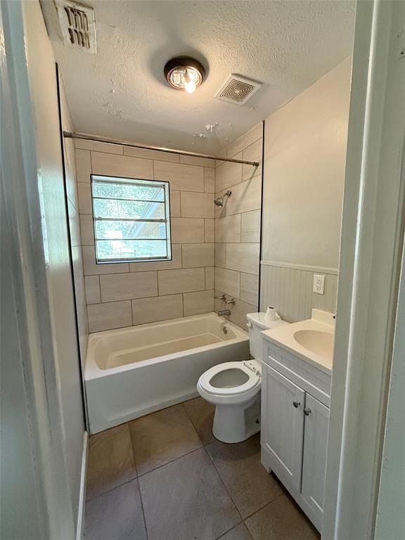 908 Sycamore Athens, TX 75751 - Photo 18 of 28 a bathroom with a sink toilet a bathtub and shower