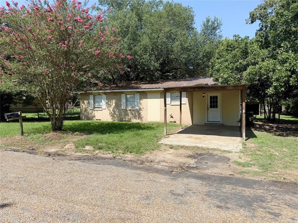 908 Sycamore Athens, TX 75751 - Photo 2 of 28 a front view of house with yard and green space