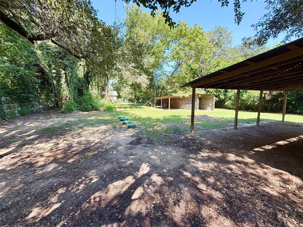 908 Sycamore Athens, TX 75751 - Photo 28 of 28 a view of a yard with porch and tree