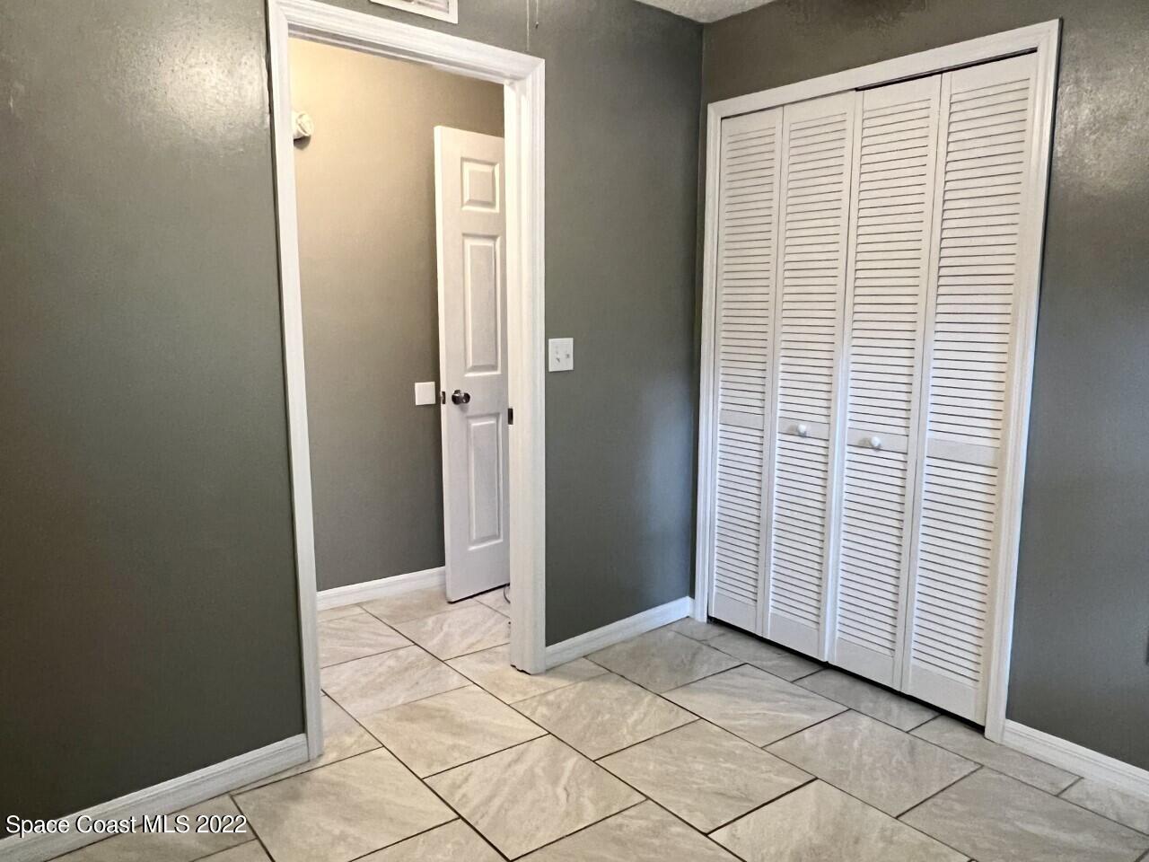 658 Waycross Road Southwest Palm Bay, FL 32908 - Photo 17 of 39 middle room closet