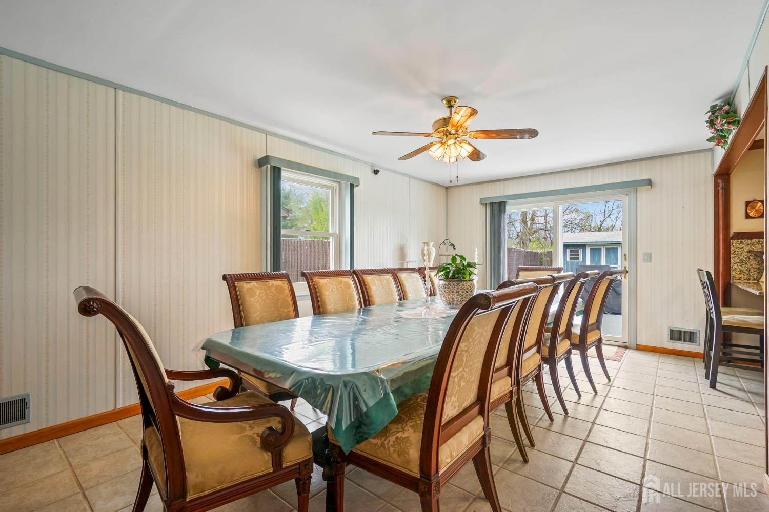 41 Rodak Circle Edison, NJ 08817 - Photo 15 of 28 a view of a dining room with furniture and a chandelier