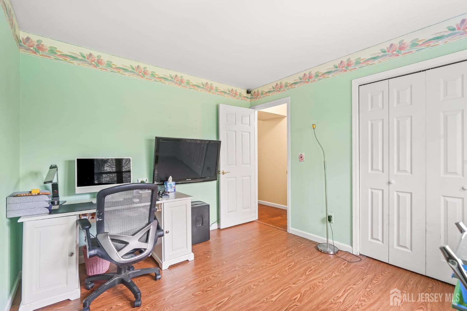 41 Rodak Circle Edison, NJ 08817 - Photo 18 of 28 a view of a workspace with furniture and a window