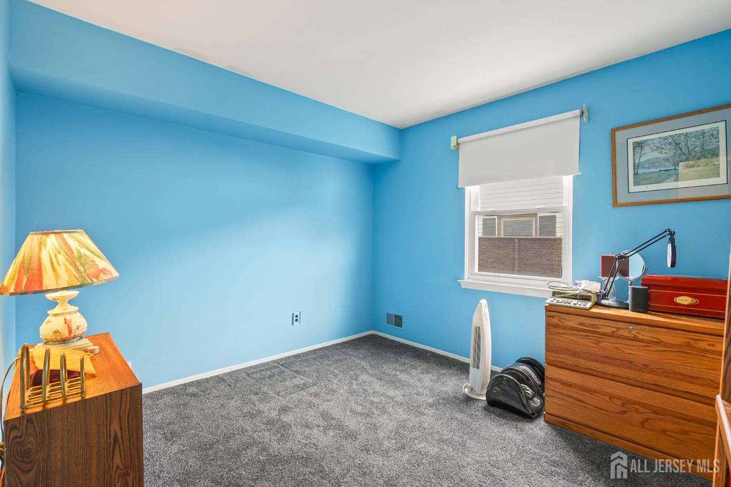 41 Rodak Circle Edison, NJ 08817 - Photo 19 of 28 a bedroom with a bed and a window