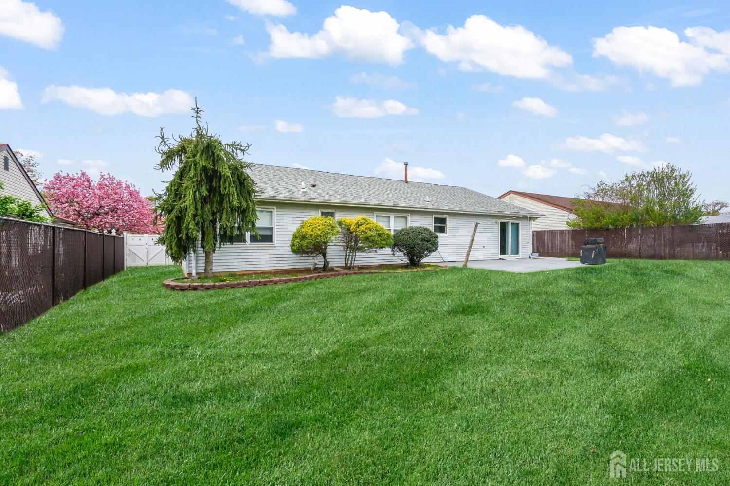 41 Rodak Circle Edison, NJ 08817 - Photo 27 of 28 a front view of a house with garden