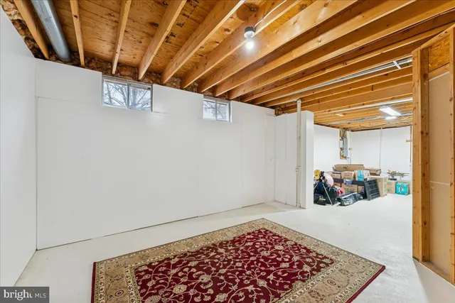 a view of a chairs and table on the wooden floor