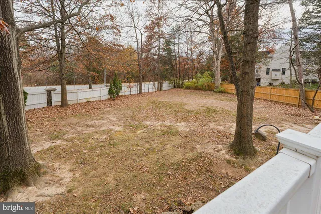 a view of a yard in front of a house