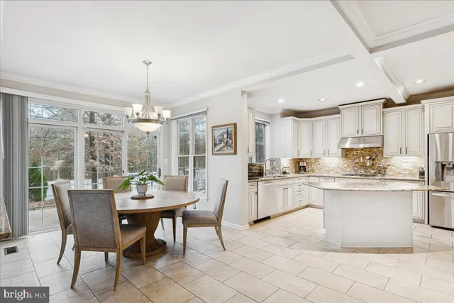 a view of a dining room kitchen and a window